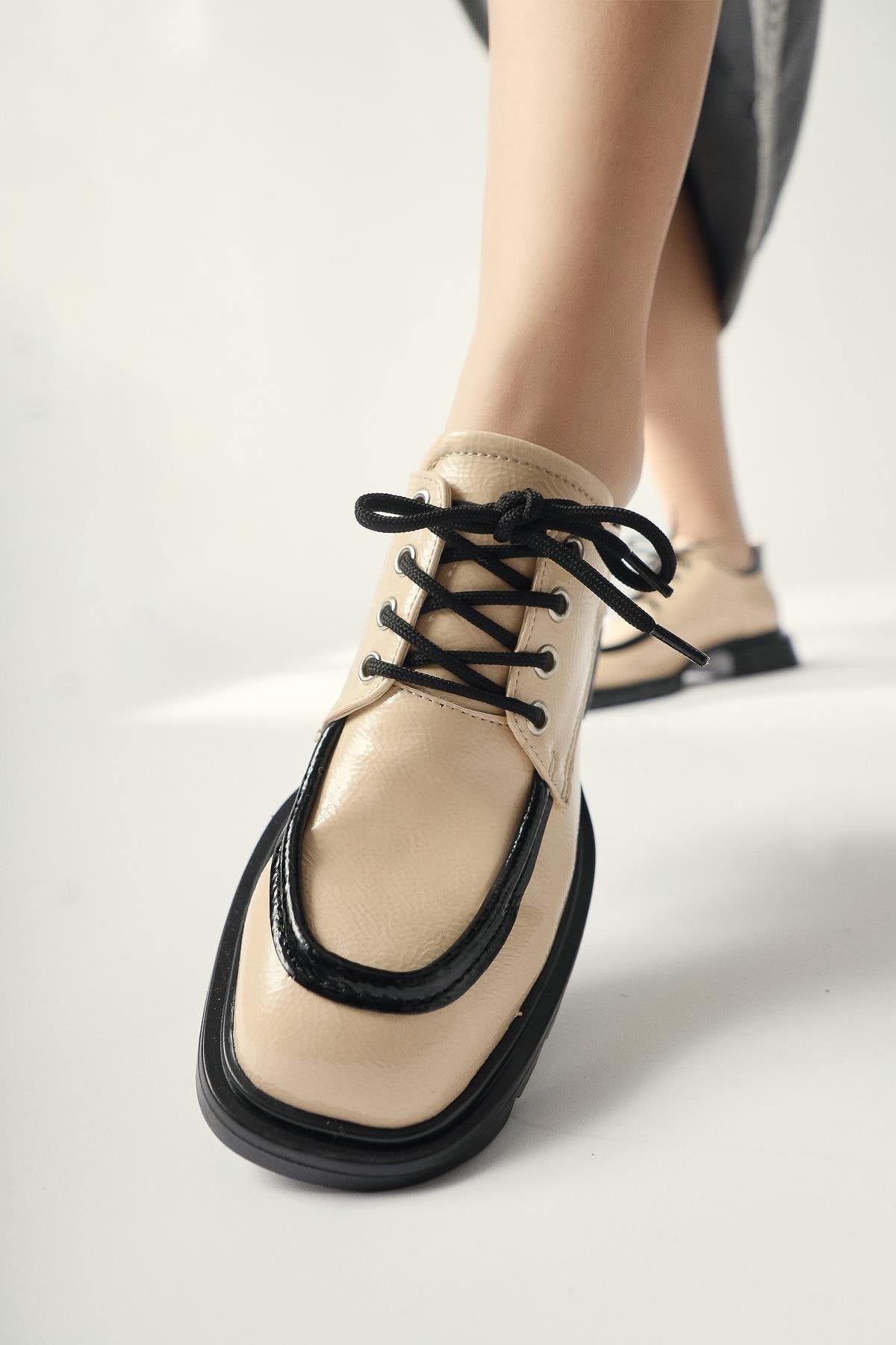 Niven Beige Wrinkled Patent Leather Black Detailed Loafers