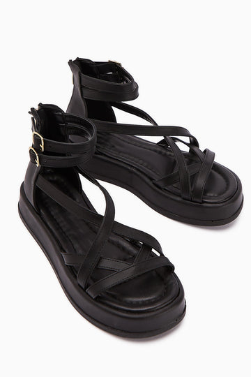 Sara Schwarze Damen Sandale mit Kreuzriemen, Dicker Sohle, Knöchelschnalle