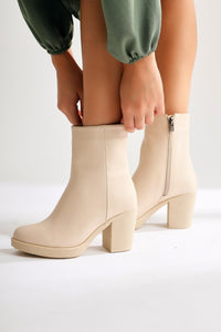 Elianne – Beige Oval-Toe Heeled Boot (Women)