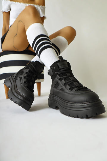 Kindra – Black Suede-Detail High-Platform Sport Boot (Women)