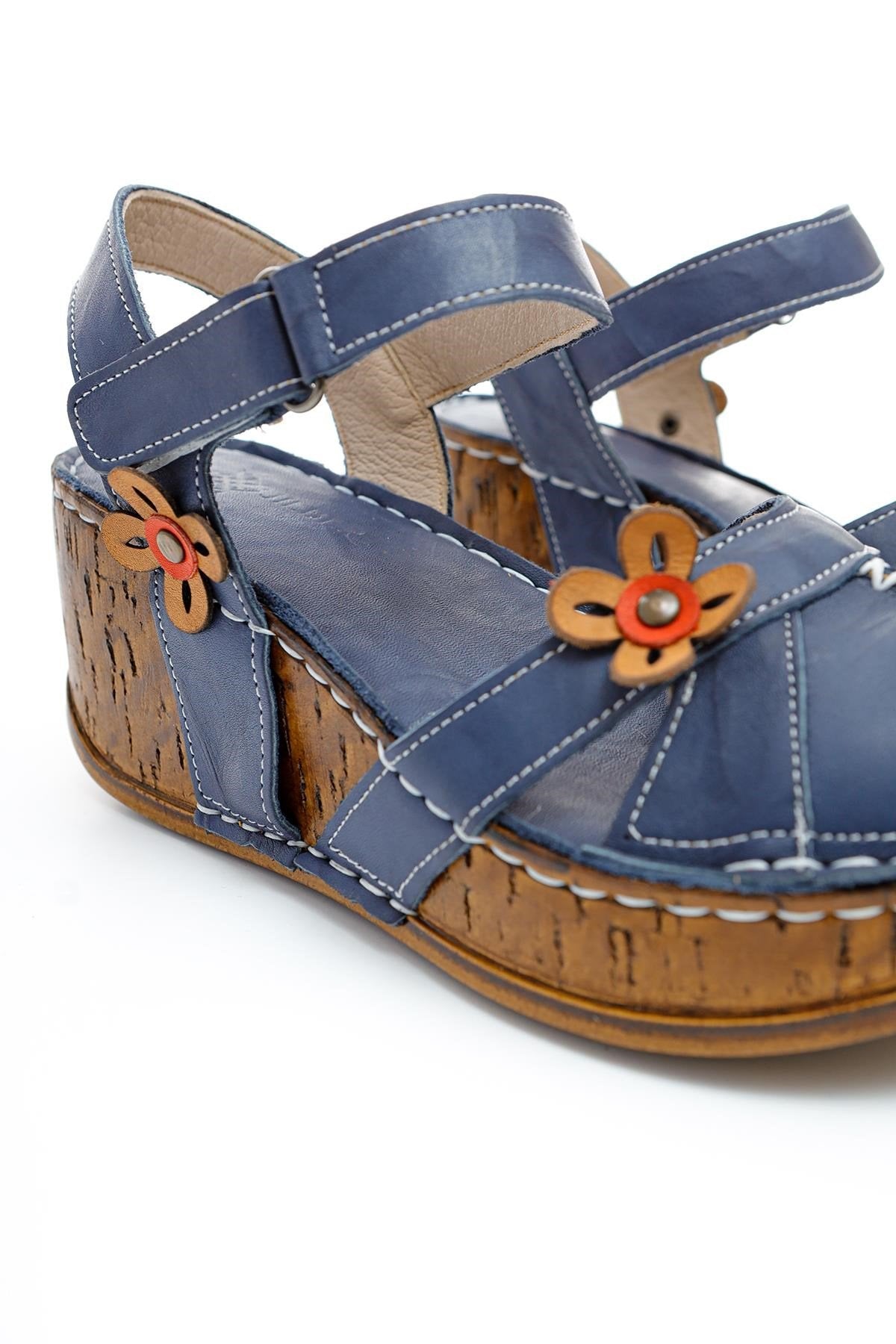 Genuine Leather Katlyn Flower Detail Closed Toe Wedge Sandals