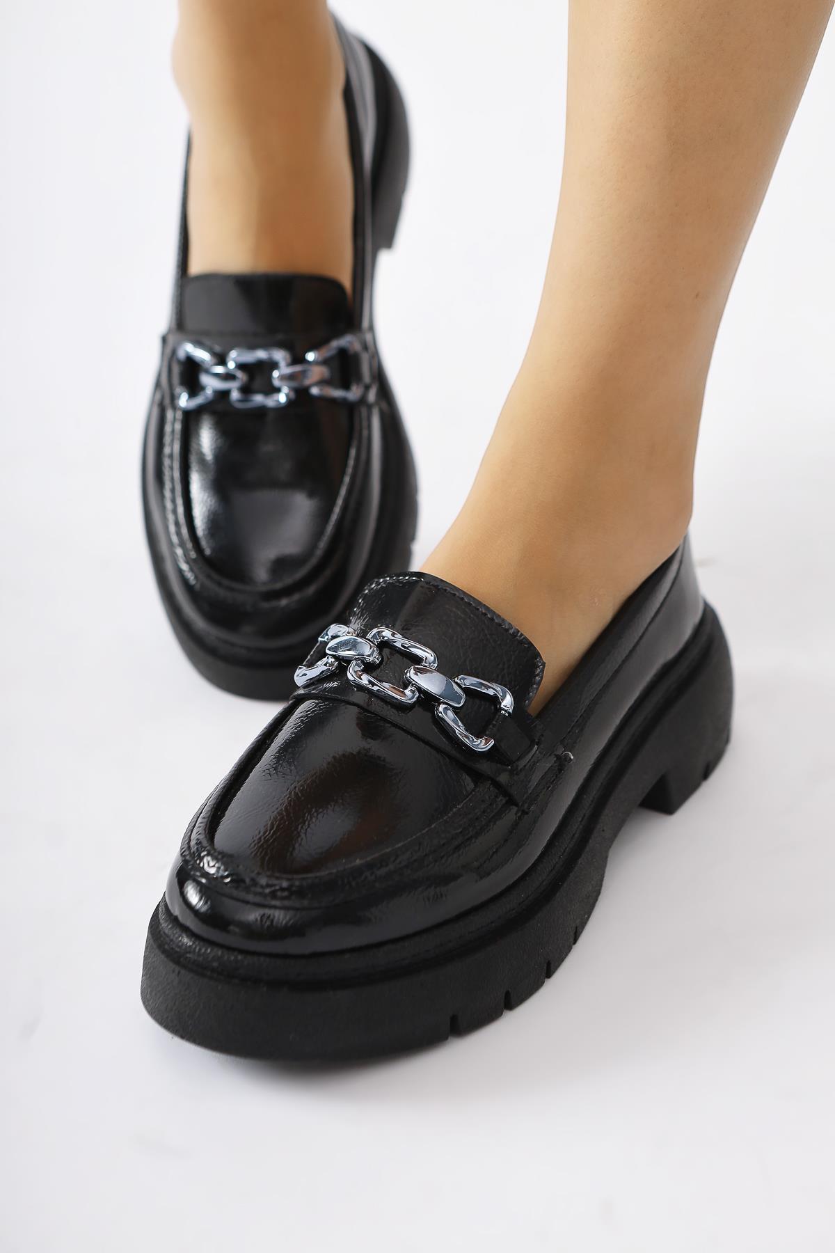 Roxne Black Crinkle Patent Leather Buckle Detailed Loafers