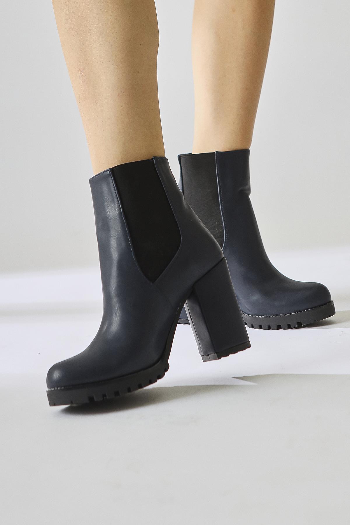 Dorsaf – Navy Oval-Toe Elasticized Heeled Boot (Women)
