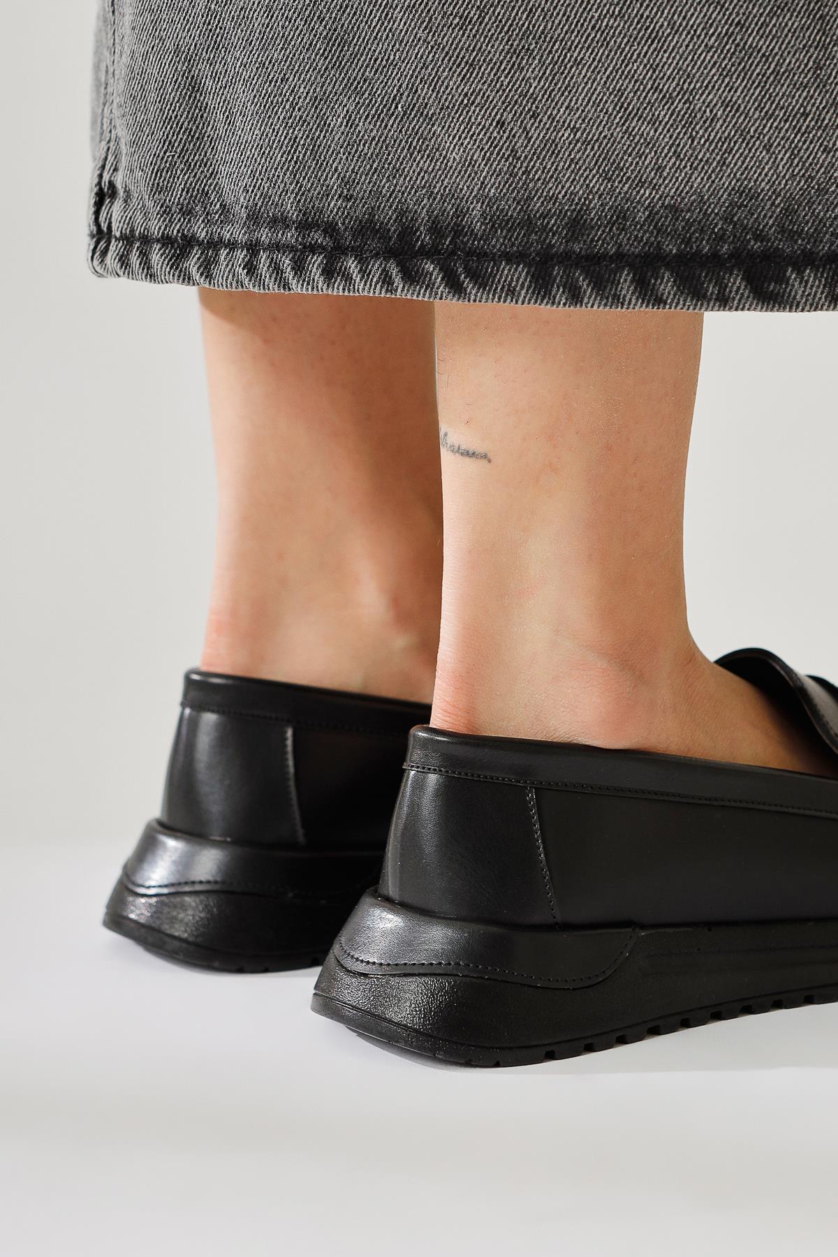 Zain Black Laser Perforated Buckle Detailed Ballerinas