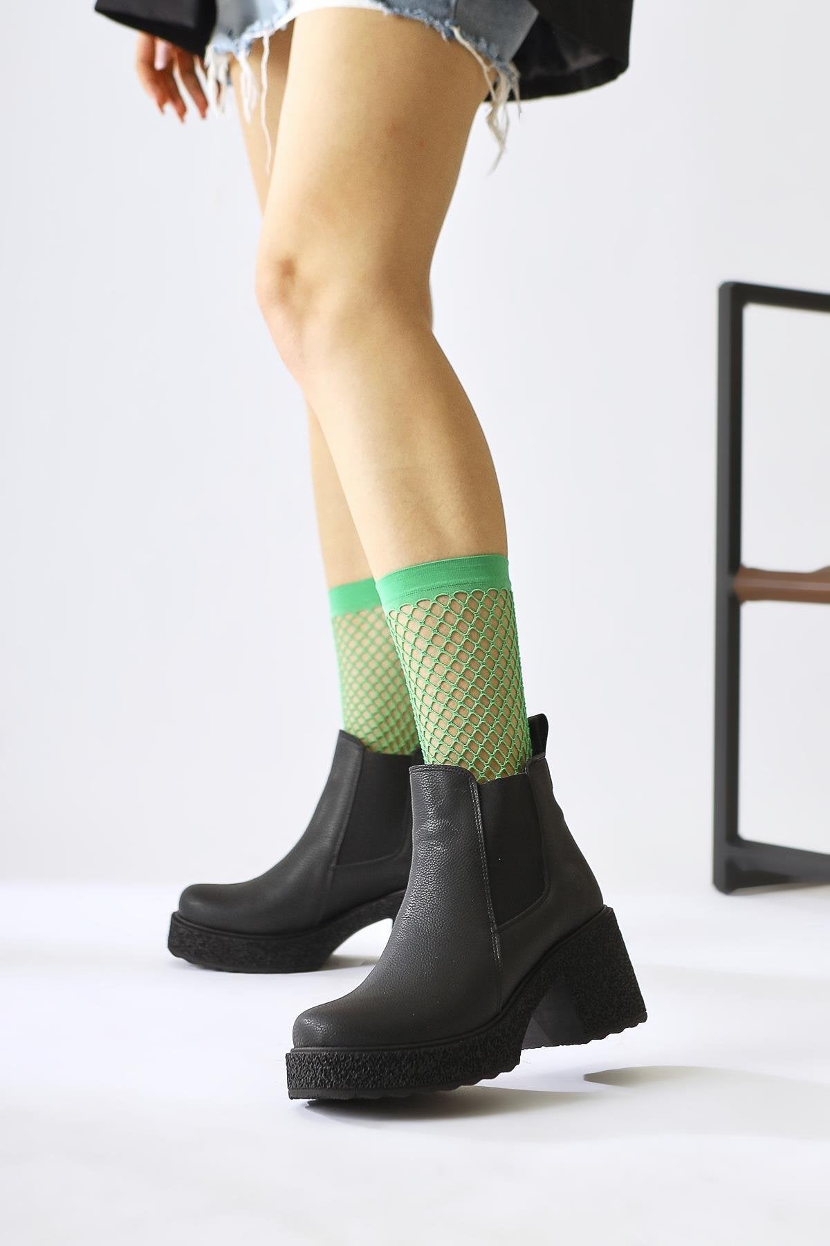 Thida – Black Elasticized Platform-Sole Pull-On Boot (Women)