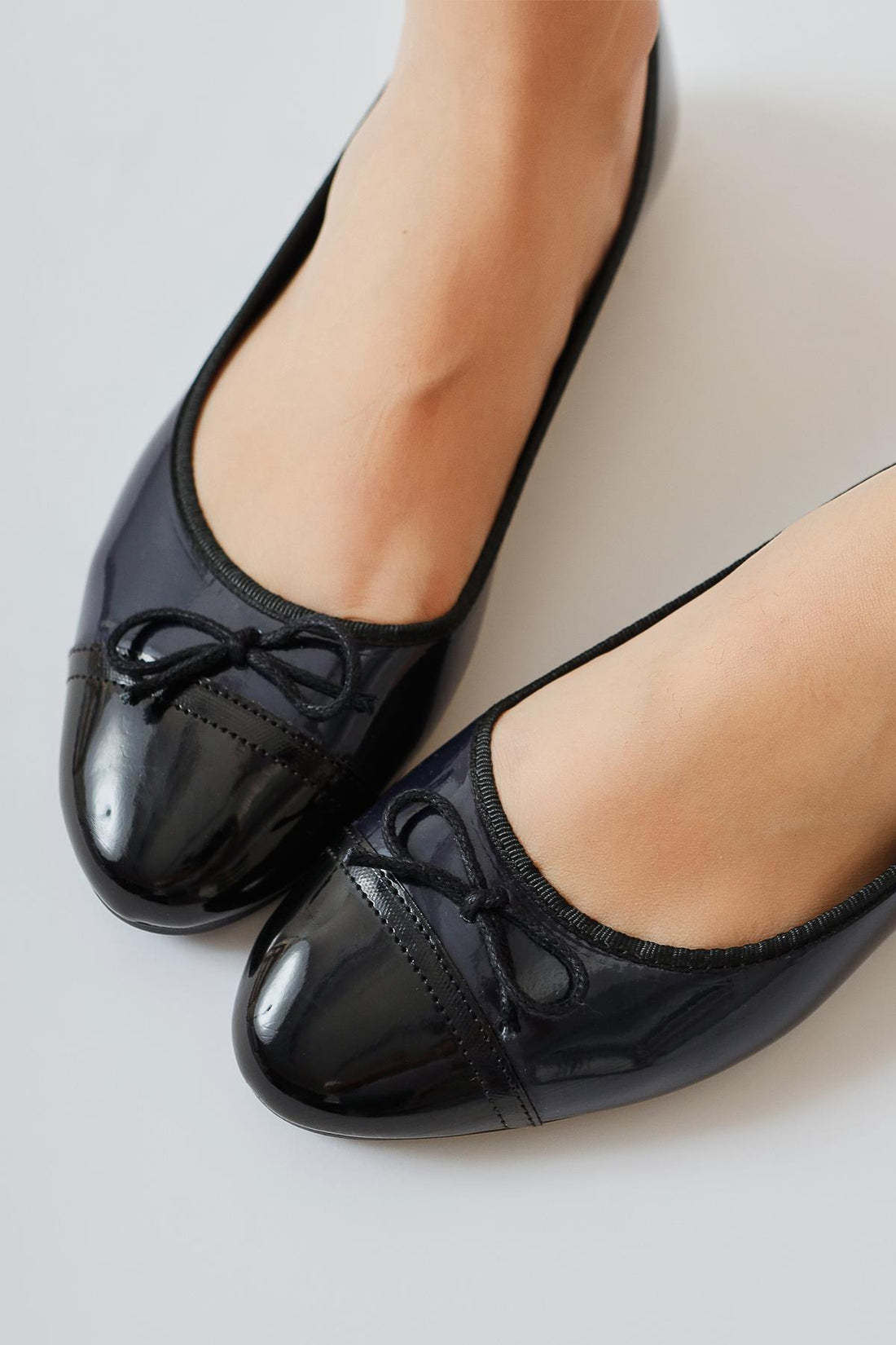 Sobhie Navy Blue Patent Leather Black Toe Bow Detailed Ballerinas