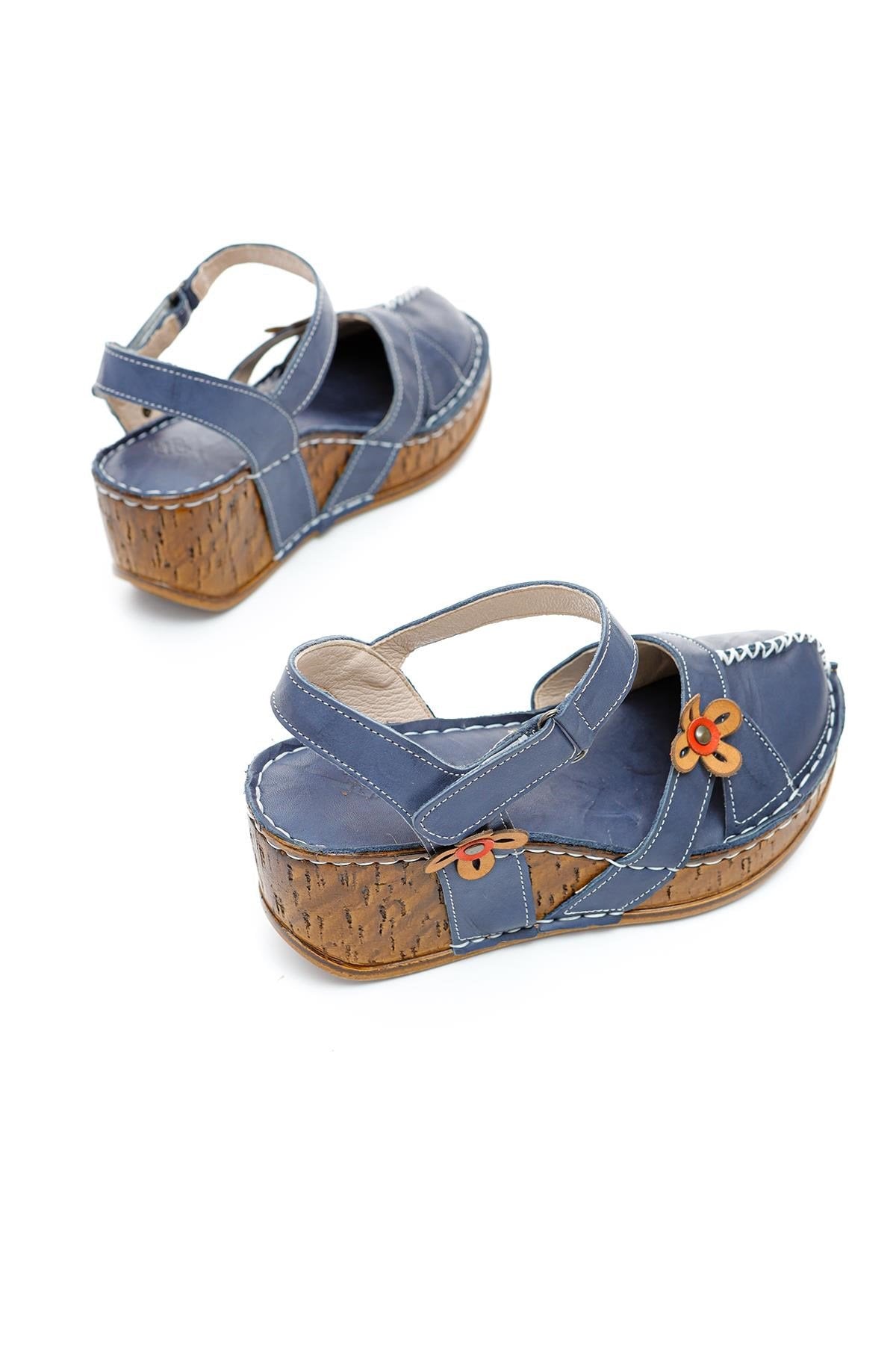 Genuine Leather Katlyn Flower Detail Closed Toe Wedge Sandals